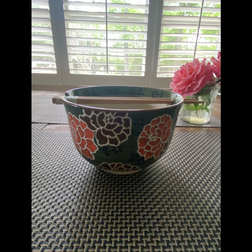 Asian floral ceramic bowl with chopsticks